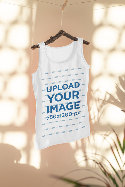 Mockup of a Tank Top Hanging on a Bedroom Featuring Some Shadows 33960