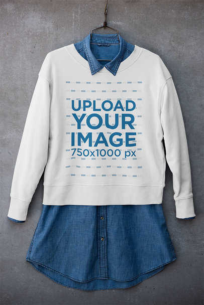 Mockup of a Crewneck Sweatshirt Placed on a Hanger with a Denim Garment 33981
