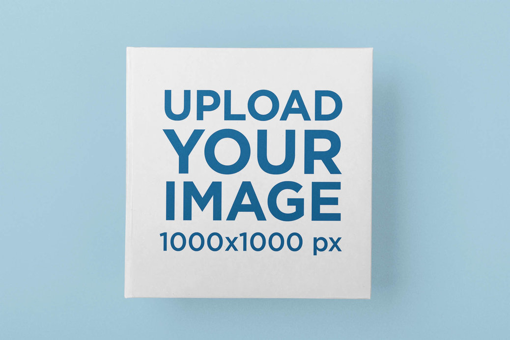 Mockup of a Squared Book Placed on a Customizable Surface