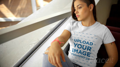 T-Shirt Video of a Woman Looking Through the Window