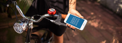 iPhone 7 Mockup Featuring a Woman in a Bicycle 12948w