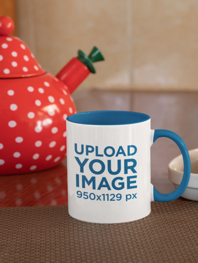 Mockup of an 11 oz Mug With a Colored Rim Placed by a Decorated Tea Pot 33822