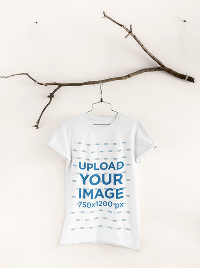 Mockup of a Tee Hanging from an Ornamental Branch