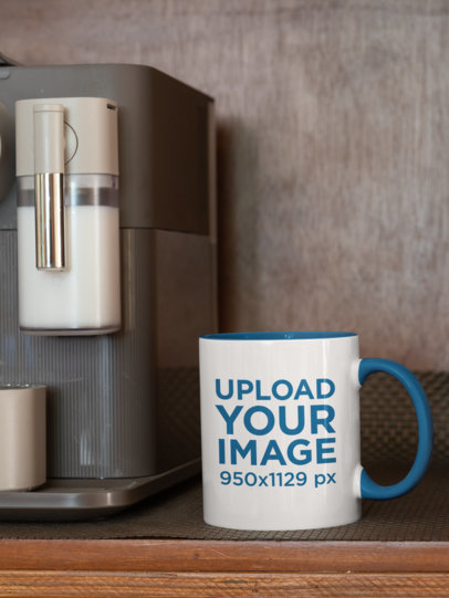 Mockup of an 11 oz Coffee Mug With a Colored Rim Placed Next to an Espresso Machine 33823