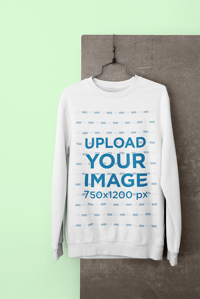 Crewneck Sweatshirt Mockup Hanging in a Minimalistic Setting