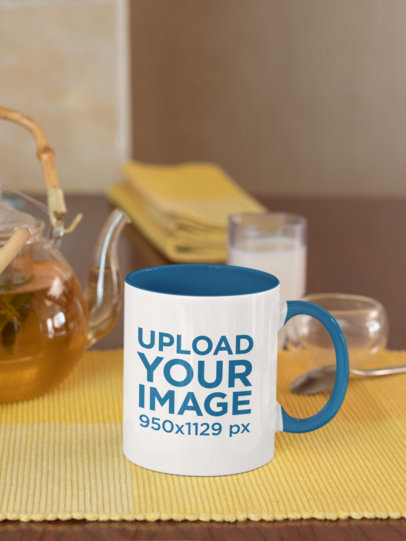 Mockup of an 11 oz Coffee Mug with Colored Rim on a Table 33828