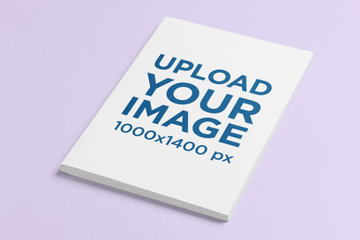 Minimal Mockup of a Paperback Book Placed on a Customizable Surface 