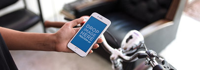 iPhone Mockup in Portrait Position Featuring a Man with a Bike in the Living Room