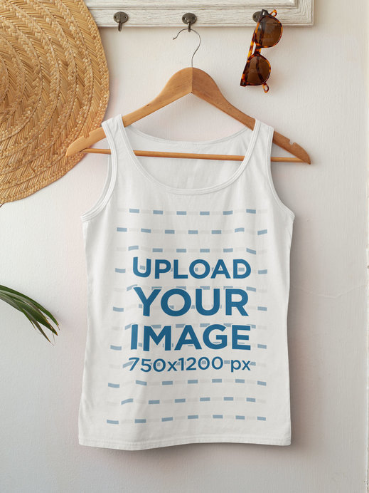 Mockup of a Customizable Women's Tank Top Hanging by Summer Accessories 