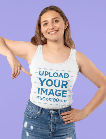 Mockup of a Happy Woman Pointing at Her Tank Top 