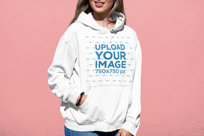 Pullover Hoodie Mockup of a Smiling Woman at a Studio