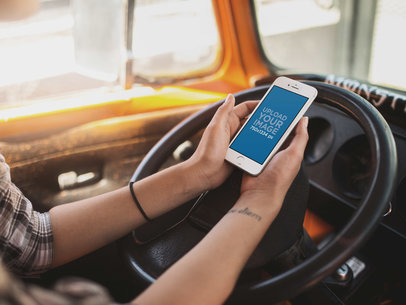 White iPhone 6s Mockup Featuring a Woman on her Van