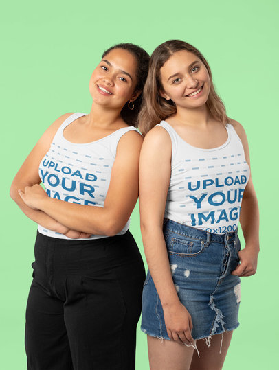Mockup of Two Young Women Wearing Tank Tops in a Studio