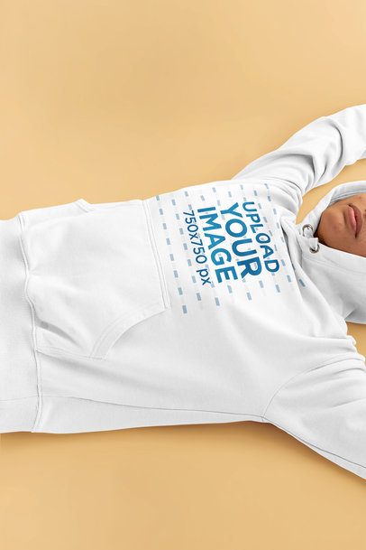 Hoodie Mockup of a Woman Lying on the Floor