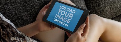 Nexus Mockup of a Young Woman Sitting on a Couch  