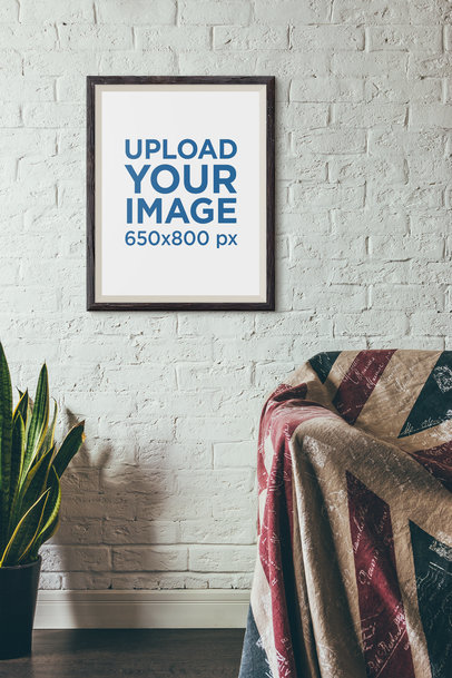 Mockup of an Art Print on the Wall of a Relaxing Living Room