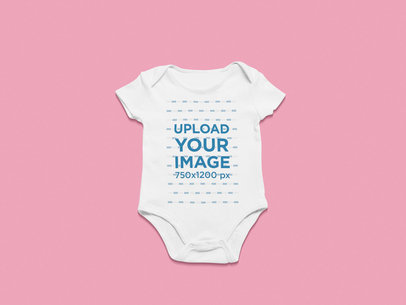 Front-View Mockup of an Onesie Against a Customizable Background