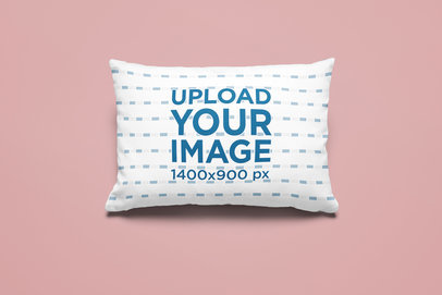 Mockup of a Customizable Rectangular Pillow Placed on a Colored Surface 25527