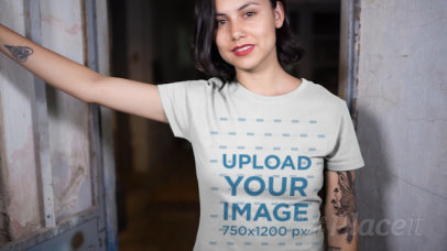 T-Shirt Video of a Short-Haired Woman with an Arm Tattoo