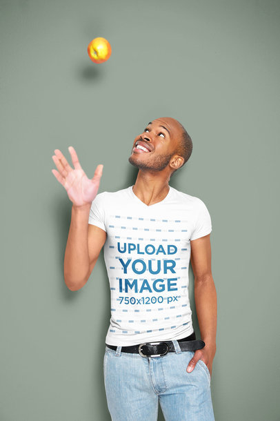 V-Neck Tee Mockup of a Man Playing with an Apple 34097-r-el2