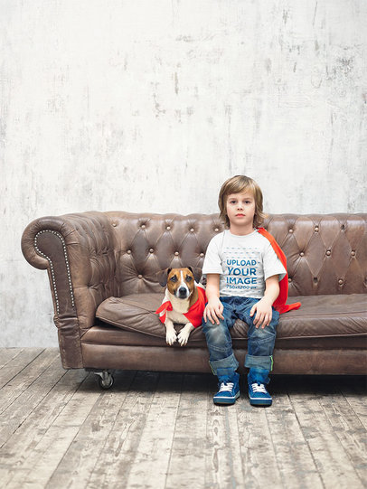 T-Shirt Mockup of a Kid and His Dog Sitting on a Couch