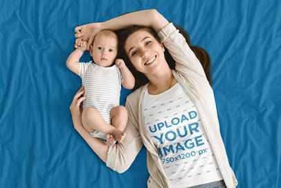 T-Shirt Mockup of a Woman Lying in Bed with Her Baby 