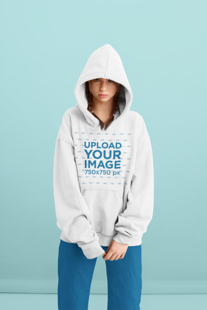 Mockup of a Serious-Looking Woman Wearing Pullover Hoodie at a Studio 34076-r-el2