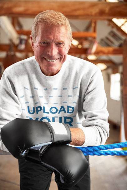 Sweatshirt Mockup Featuring an Elderly Man with Boxing Gloves 34211-r-el2