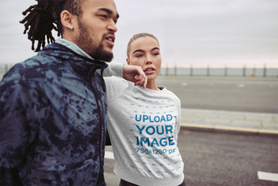 Mockup of a Woman with a Sweatshirt Leaning on Her Friend