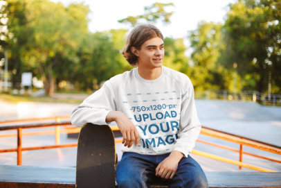 Crewneck Sweatshirt Mockup of a Man Leaning on His Skateboard 