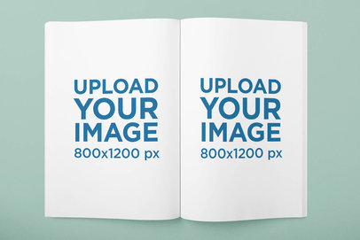 Mockup of a Wide Open Paperback Book in a Minimalist Setting