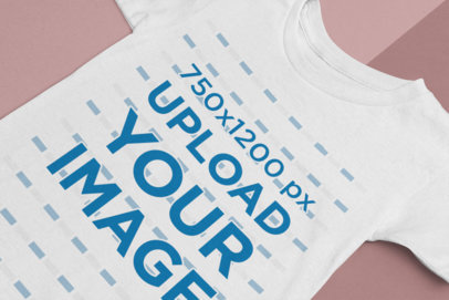 Closeup Mockup of a Flat Laid Basic T-Shirt 