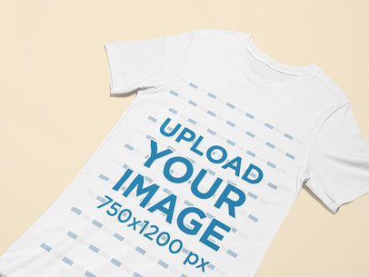 Closeup Mockup of a T-Shirt Laid on a Customizable Surface