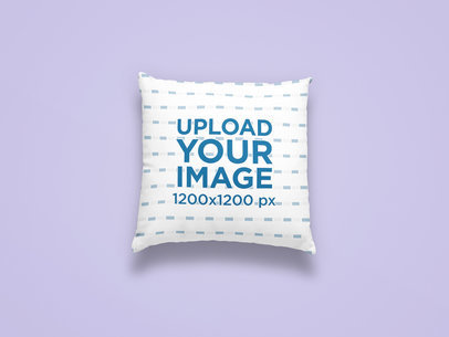 Mockup of a Squared Pillow Centered on a Colored Surface
