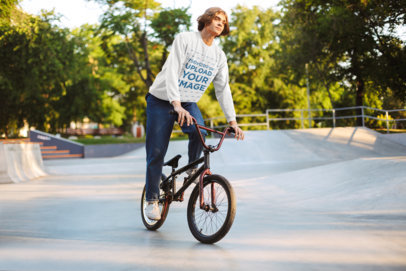 Sweatshirt Mockup of a Young Man Using an Acrobatic Bicycle 34013-r-el2