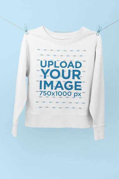 Mockup of a Round Neck Sweatshirt Suspended by Clothespins 33989
