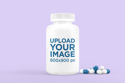 Mockup of a Plastic Pill Bottle Featuring Some Pills