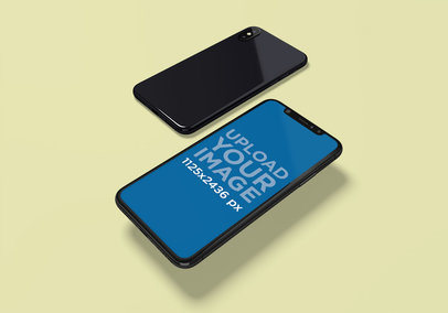 Mockup Featuring the Front and Back Sides of an iPhone X Over a Colored Surface 2005-el1