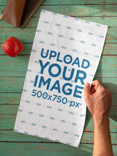 Mockup of a Man Holding a Tubular Bandana