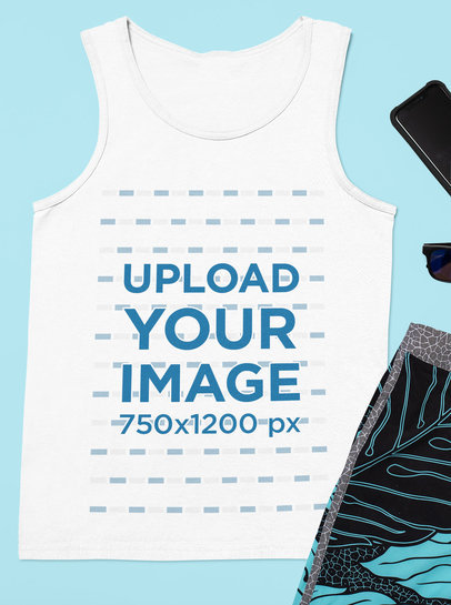 Mockup Featuring a Customizable Tank Top Lying Among Other Items 33713