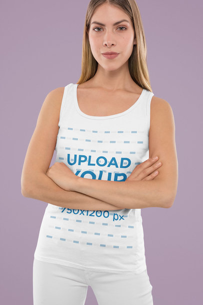 Tank Top Mockup Featuring a Young Serious Woman With Her Arms Crossed