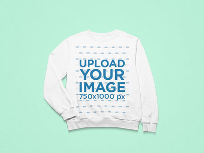 Mockup of a Crewneck Sweatshirt with a Folded Sleeve on a Minimalist Setting 