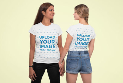 Mockup Featuring Two Women Wearing T-Shirts and Looking at Each Other 
