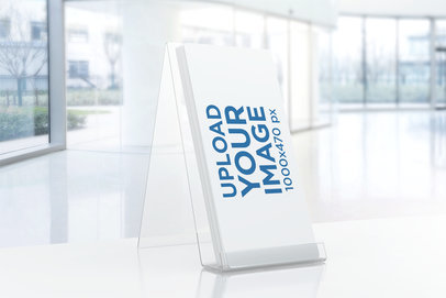 Mockup of Some Gift Vouchers Displayed on a Desk