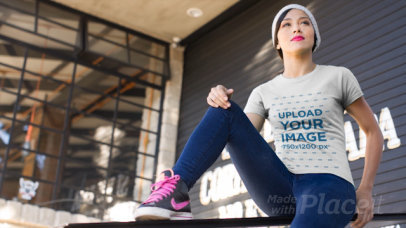 T-Shirt Video of a Woman with Urban Look Sitting Outside a Restaurant