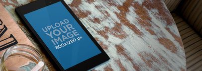 Mockup of a Nexus 7 Placed on a Rustic Coffee Table 