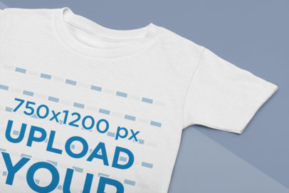 Closeup View Mockup of a Round Neck T-Shirt on Two Cardboards