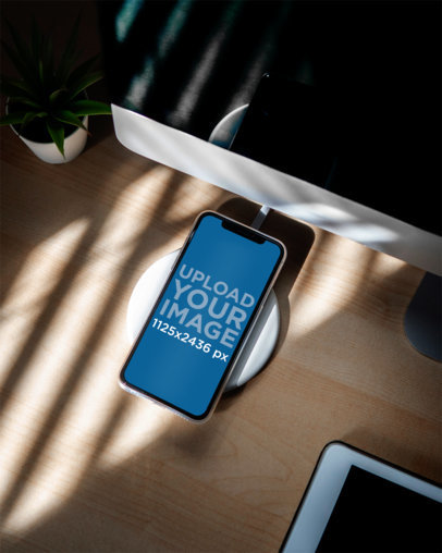 Mockup of an iPhone 11 Pro Featuring a Wireless Charger 3836-el1