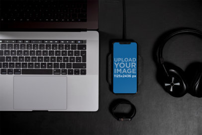 Mockup of an iPhone 11 Pro Placed on a Wireless Charger 