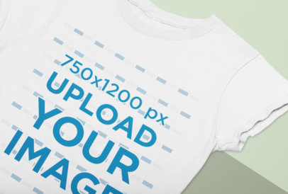 Closeup Mockup of a Round Neck Tee on a Bicolor Surface